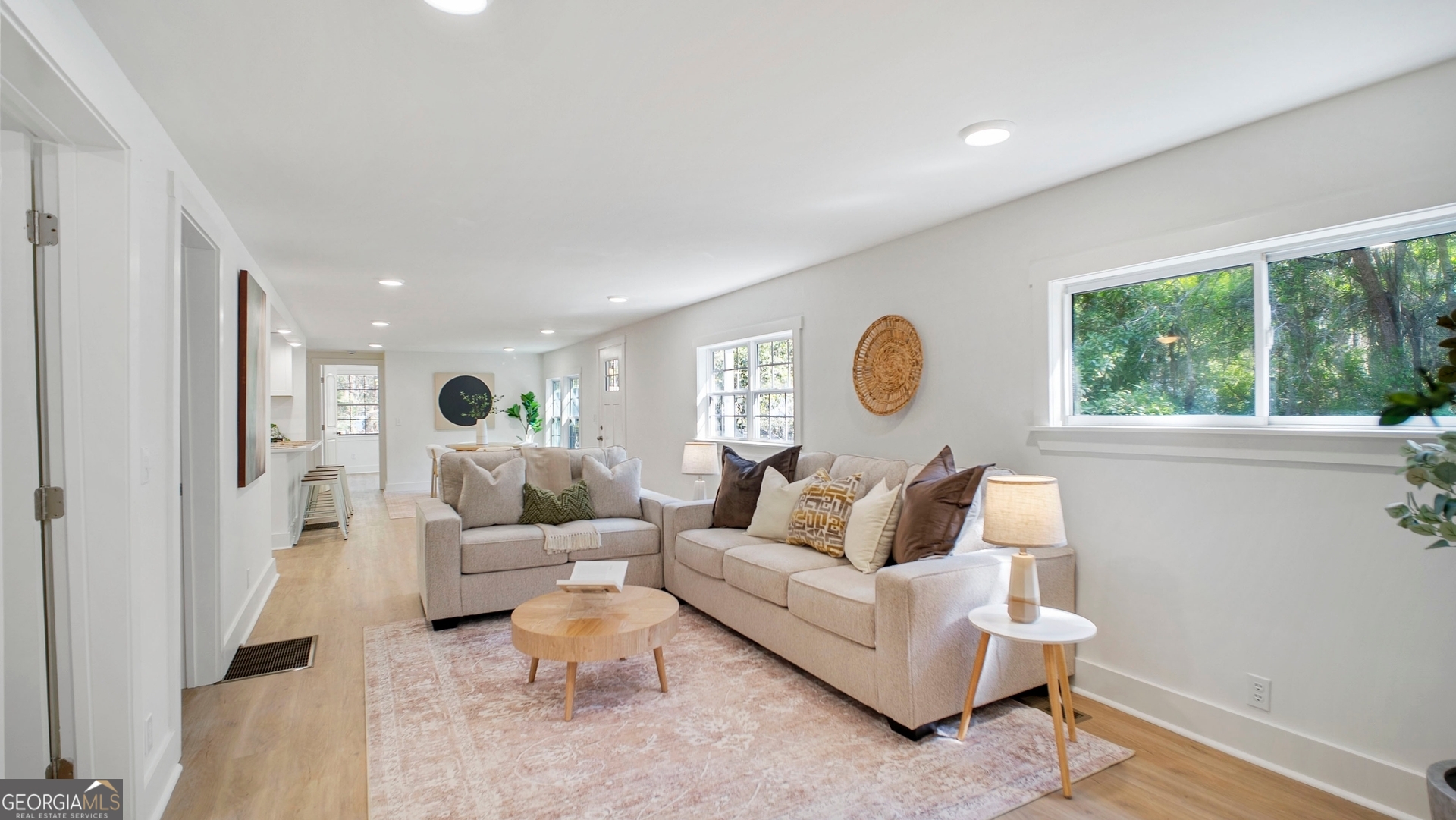 79 Terry Drive Midway, GA 31320 - Photo 4 of 27 a living room with furniture and a large window
