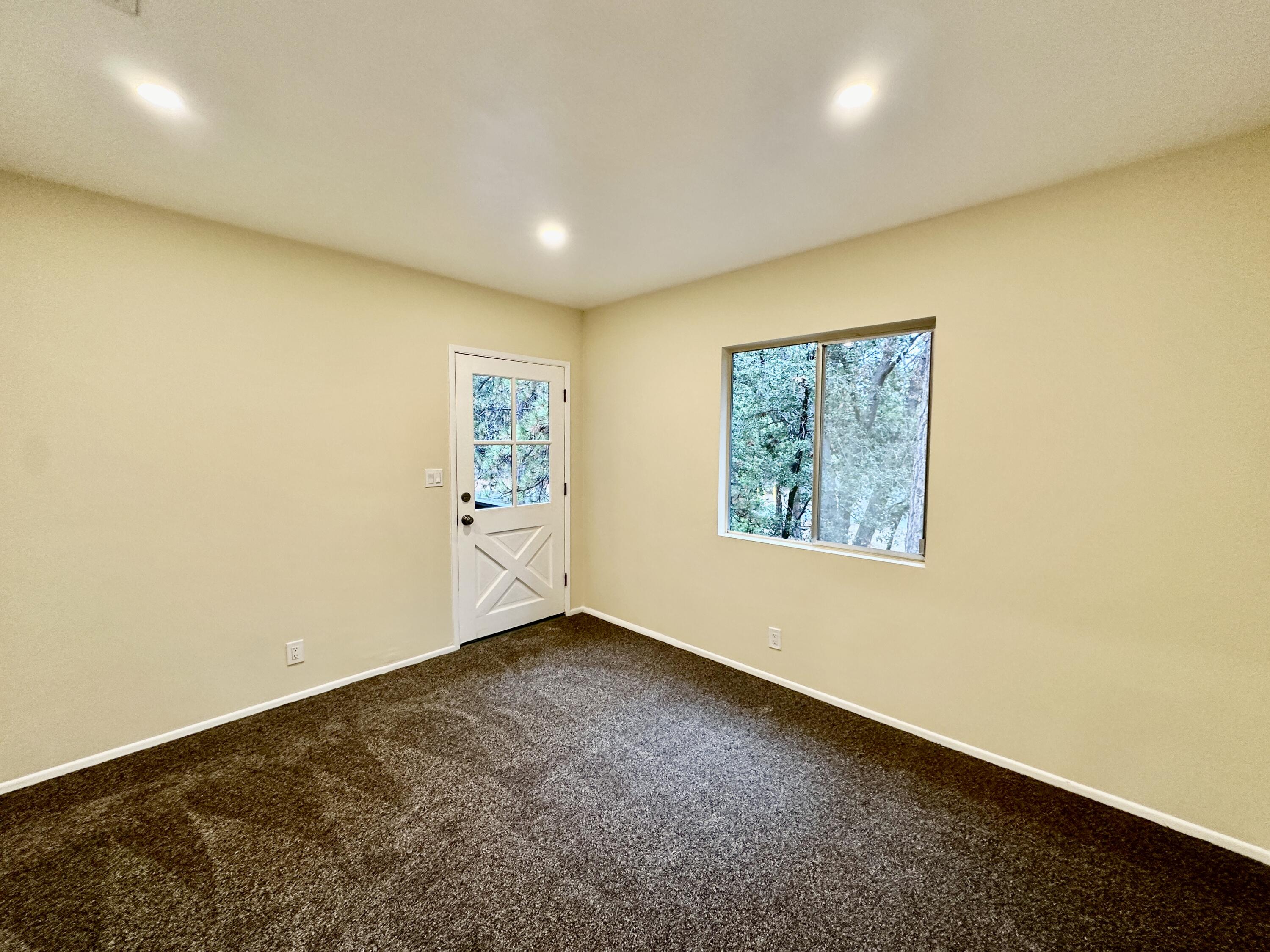 25340 Marion Ridge Drive Idyllwild, CA 92549 - Photo 22 of 31 an empty room with windows
