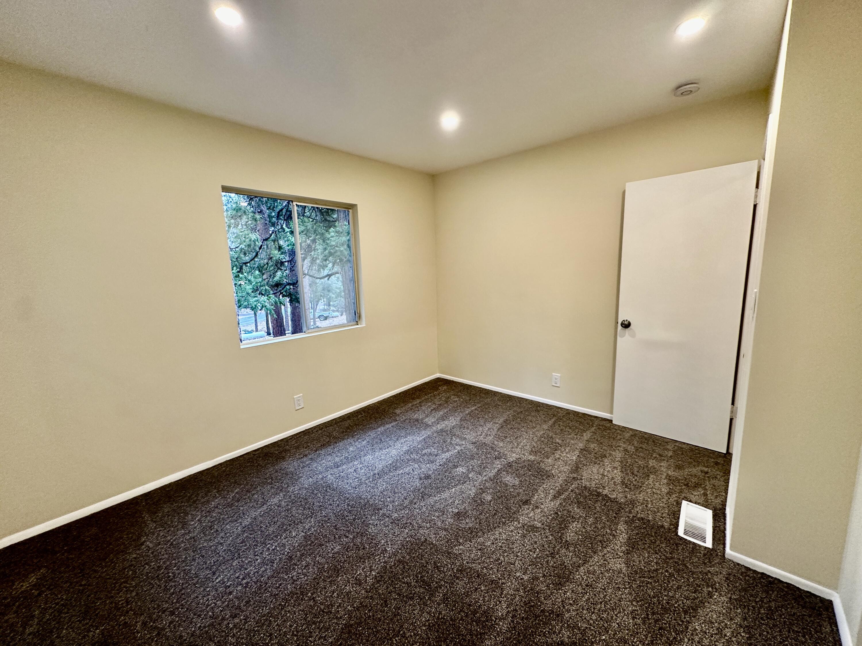 25340 Marion Ridge Drive Idyllwild, CA 92549 - Photo 25 of 31 an empty room with a window