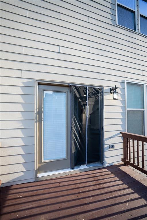 2215 A Manor Pointe Drive Cumming, GA 30041 - Photo 11 of 49 a view of a wooden deck