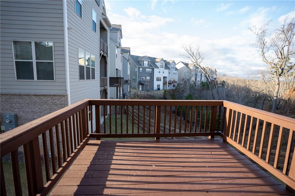 2215 A Manor Pointe Drive Cumming, GA 30041 - Photo 12 of 49 a view of city from a balcony