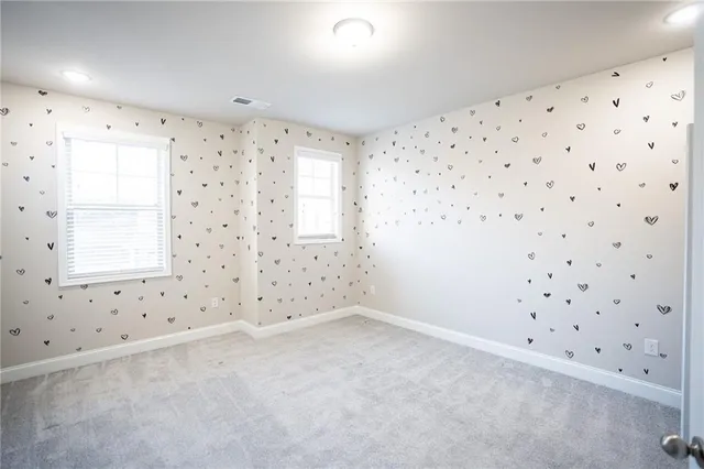 an empty room with window