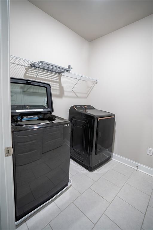 2215 A Manor Pointe Drive Cumming, GA 30041 - Photo 40 of 49 a view of a utility room with washer and dryer