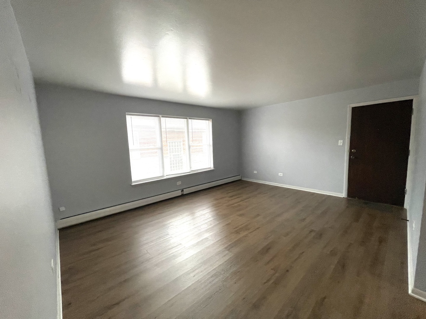 3642 147th Place Midlothian, IL 60445 - Photo 15 of 16 an empty room with wooden floor and windows
