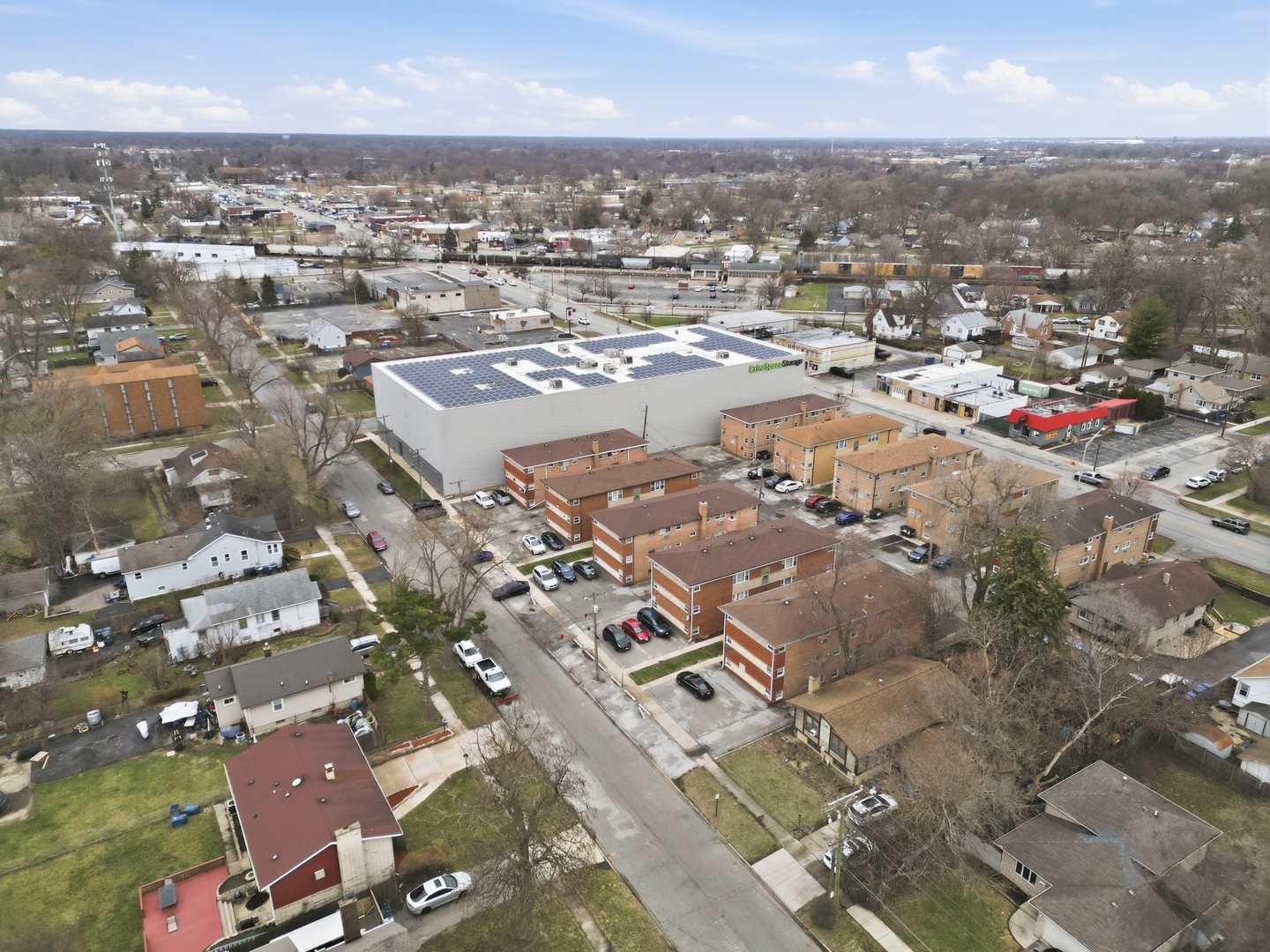 3642 147th Place Midlothian, IL 60445 - Photo 4 of 16 an aerial view of a city with lots of residential buildings