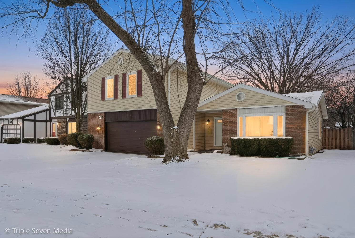 454 Stone Place Wheeling, IL 60090 - Photo 2 of 11 a view of a house with a snow in front of house