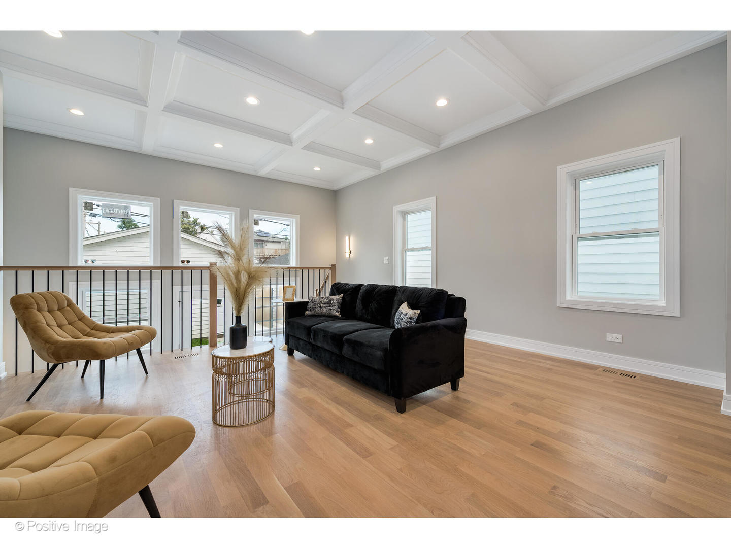 3107 North Oakley Avenue Chicago, IL 60618 - Photo 14 of 28 a living room with furniture and a wooden floor