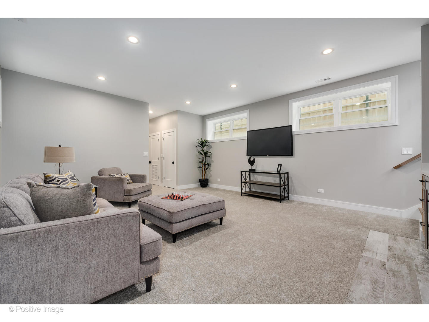 3107 North Oakley Avenue Chicago, IL 60618 - Photo 19 of 28 a living room with furniture and a flat screen tv
