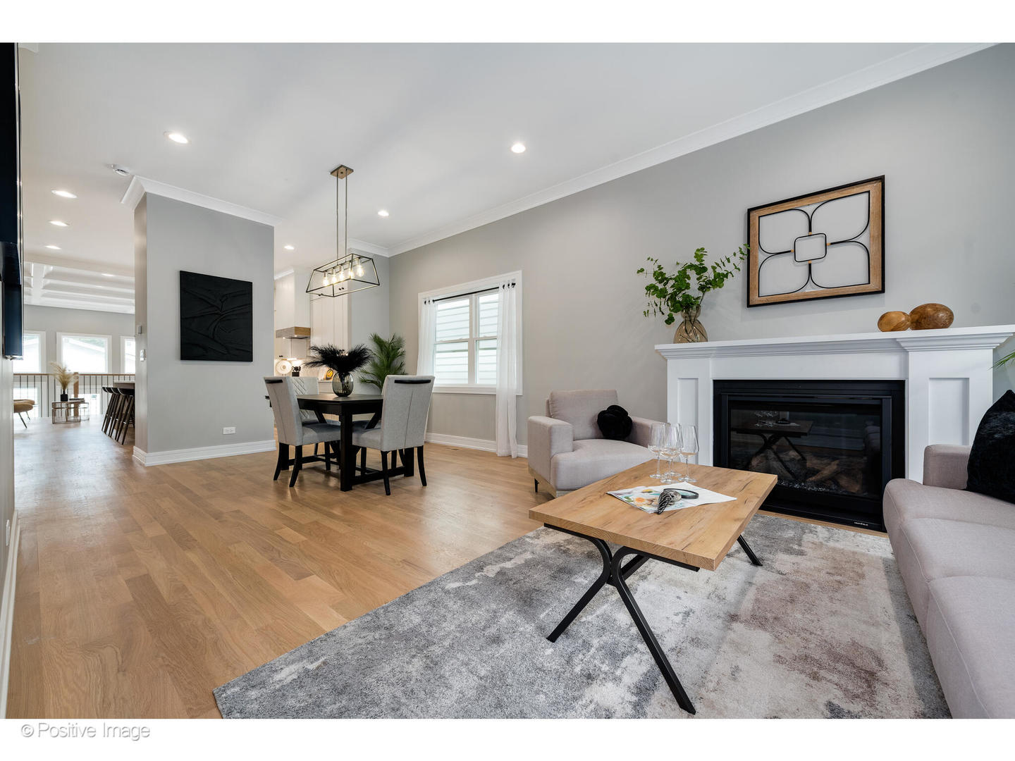 3107 North Oakley Avenue Chicago, IL 60618 - Photo 2 of 28 a living room with furniture and a fireplace