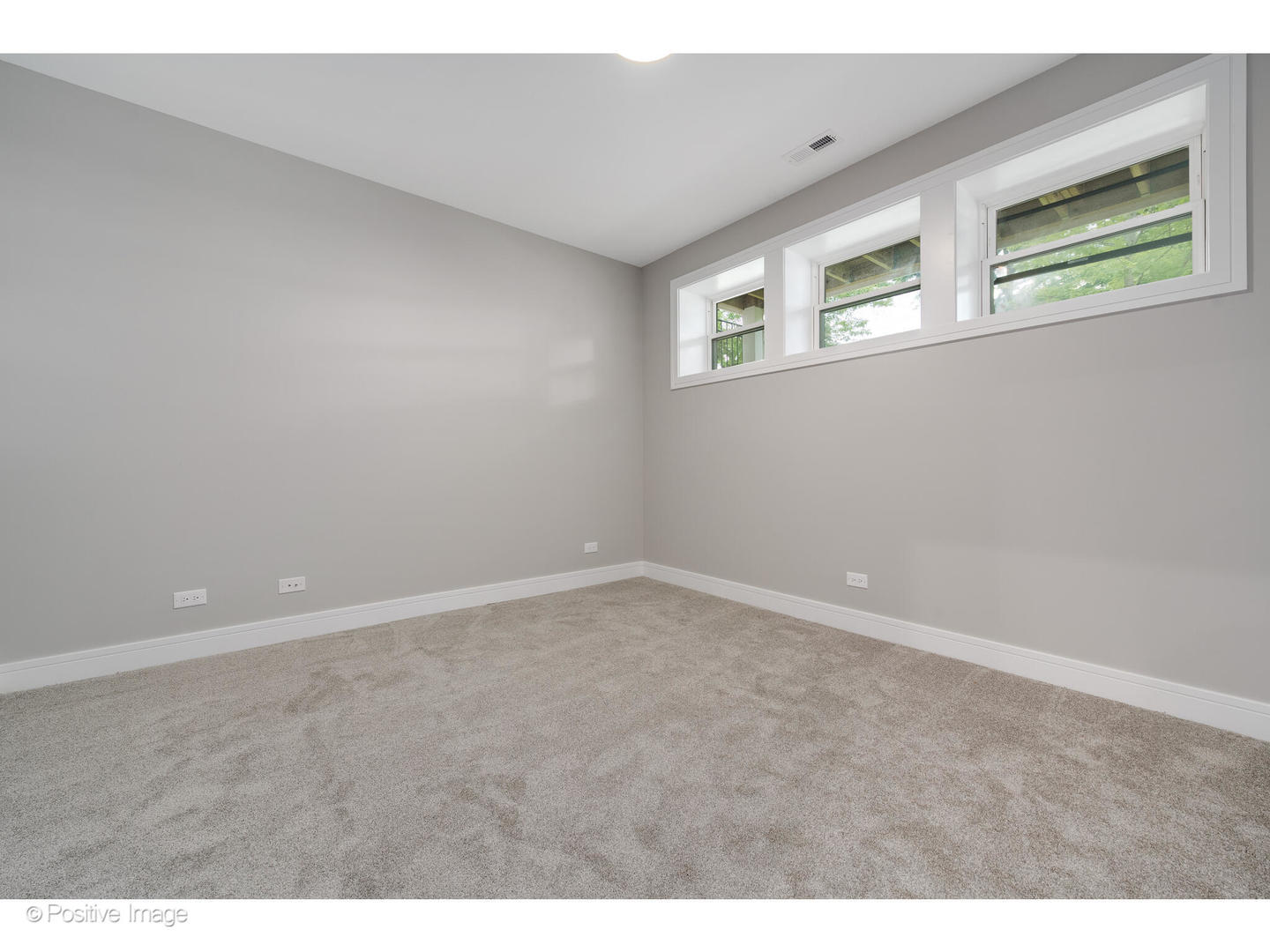 3107 North Oakley Avenue Chicago, IL 60618 - Photo 23 of 28 a view of an empty room with windows