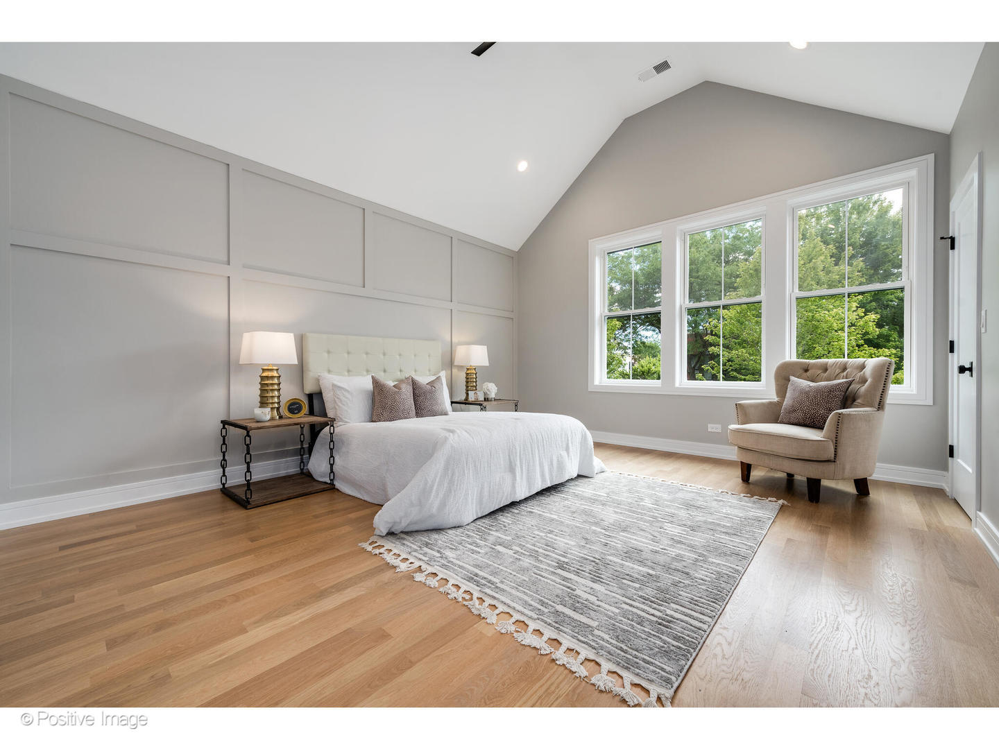 3107 North Oakley Avenue Chicago, IL 60618 - Photo 24 of 28 a bedroom with a bed a couch and a large window