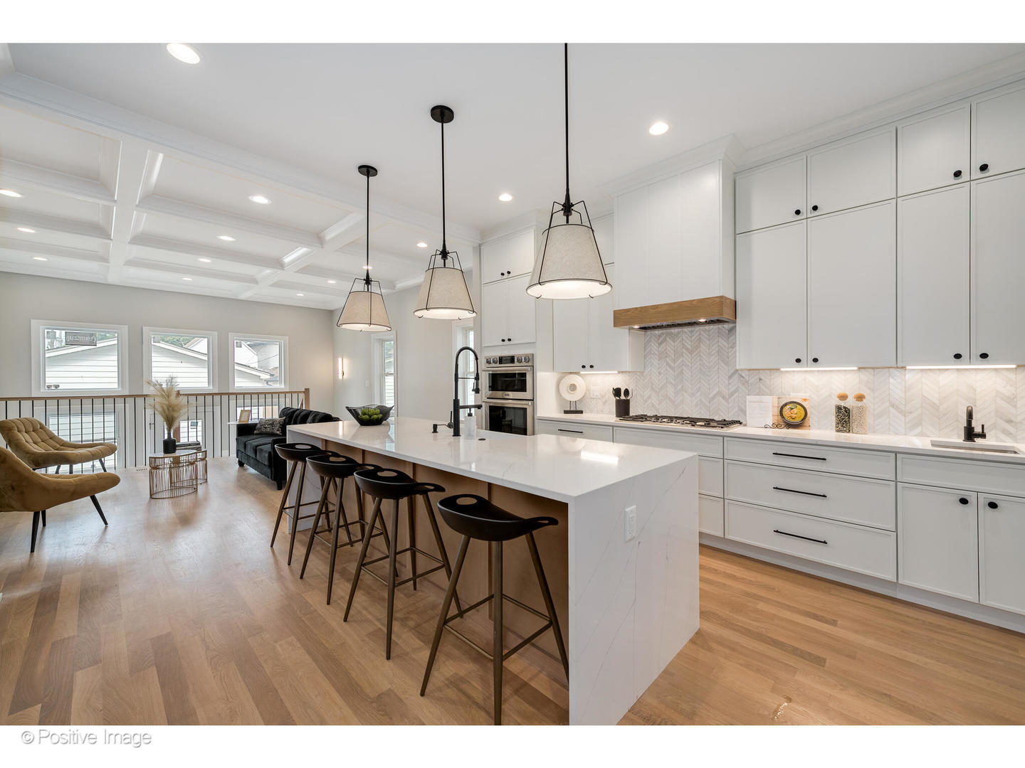 3107 North Oakley Avenue Chicago, IL 60618 - Photo 7 of 28 a kitchen with stainless steel appliances granite countertop a sink a stove a dining table chairs and view living room