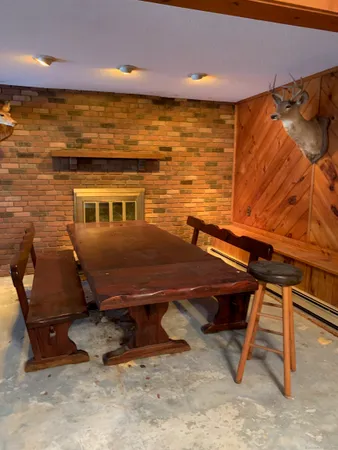 a kitchen with cabinets and window