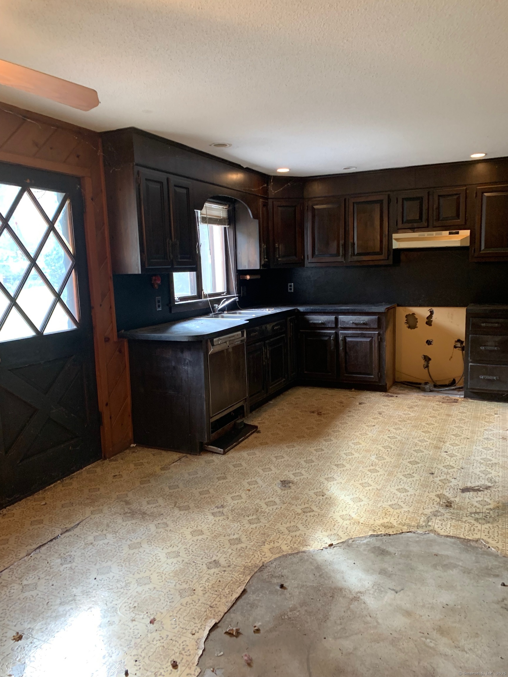 99 Obtuse Hill Road Brookfield, CT 06804 - Photo 15 of 31 a kitchen with cabinets and window