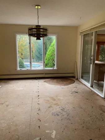 a kitchen with stainless steel appliances granite countertop a stove and a microwave
