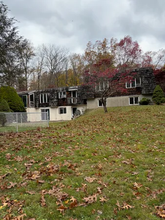 a front view of house with garden