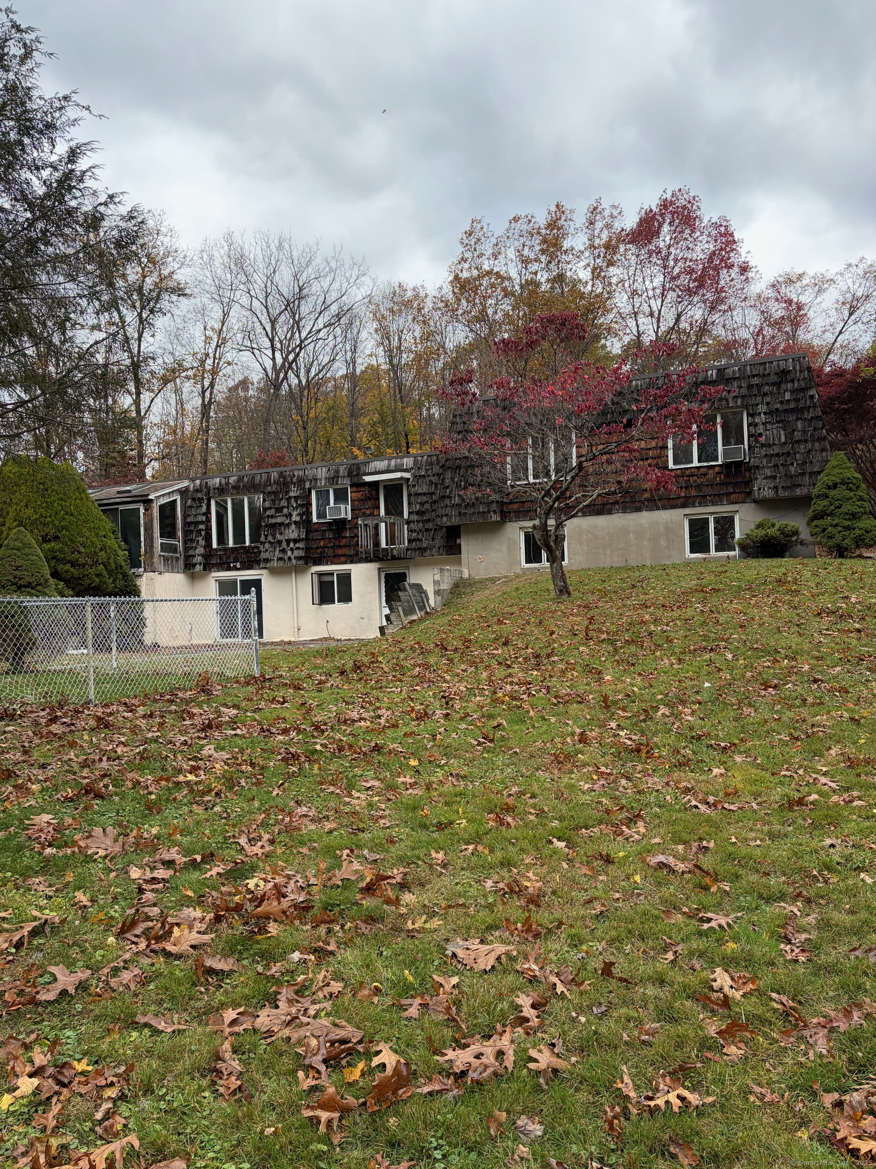 99 Obtuse Hill Road Brookfield, CT 06804 - Photo 27 of 31 a view of house with a yard