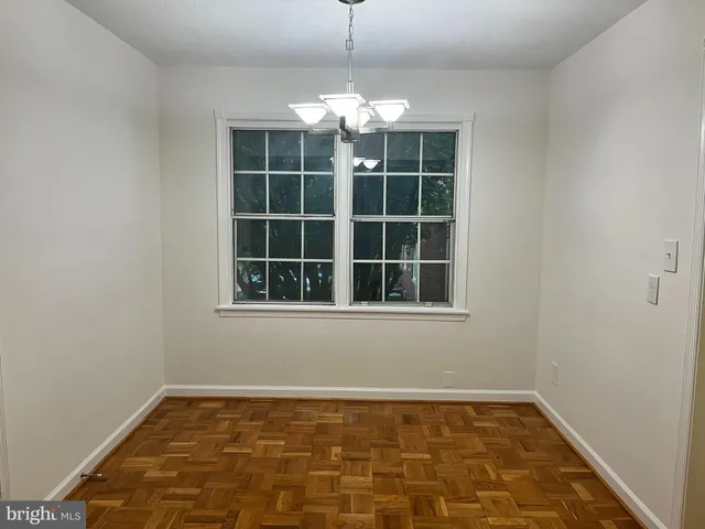 a view of a room with windows