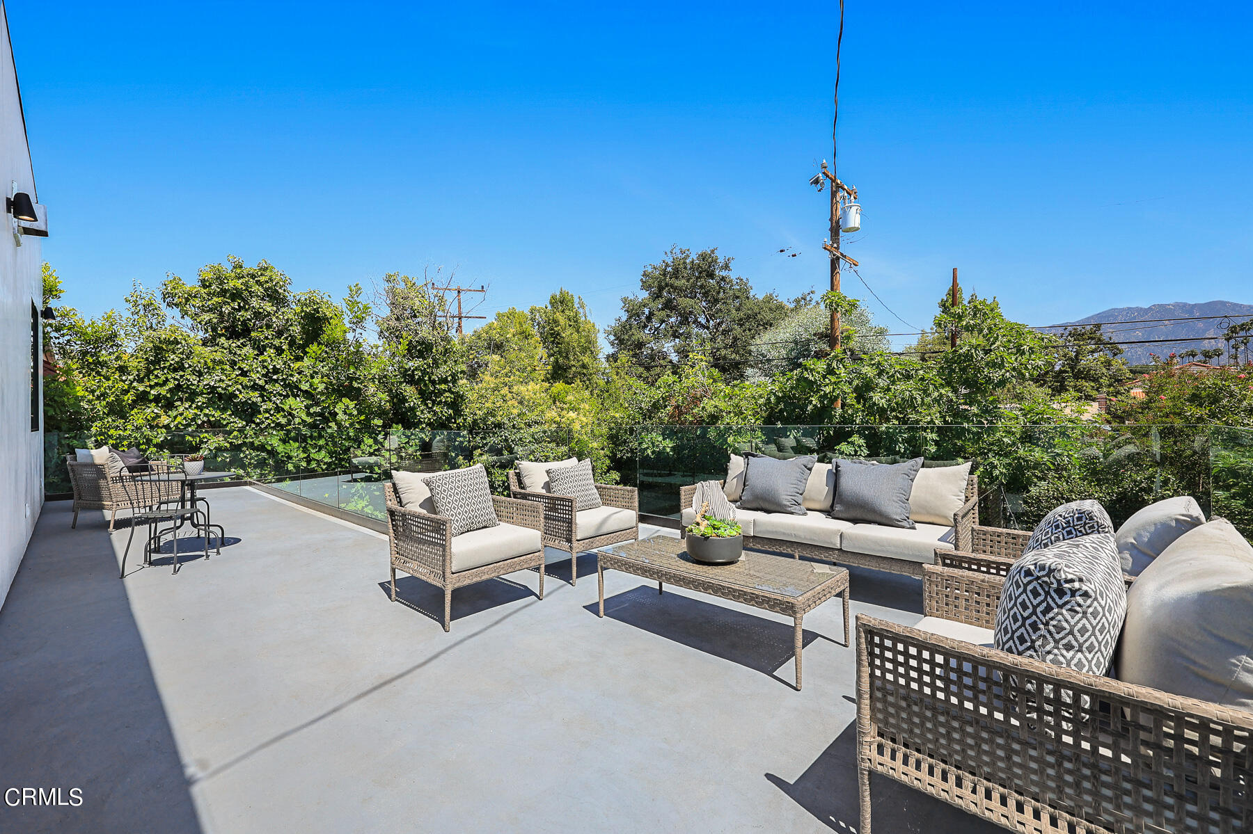 2065 Oakdale Street Pasadena, CA 91107 - Photo 3 of 7 a view of a terrace with couches and sky view