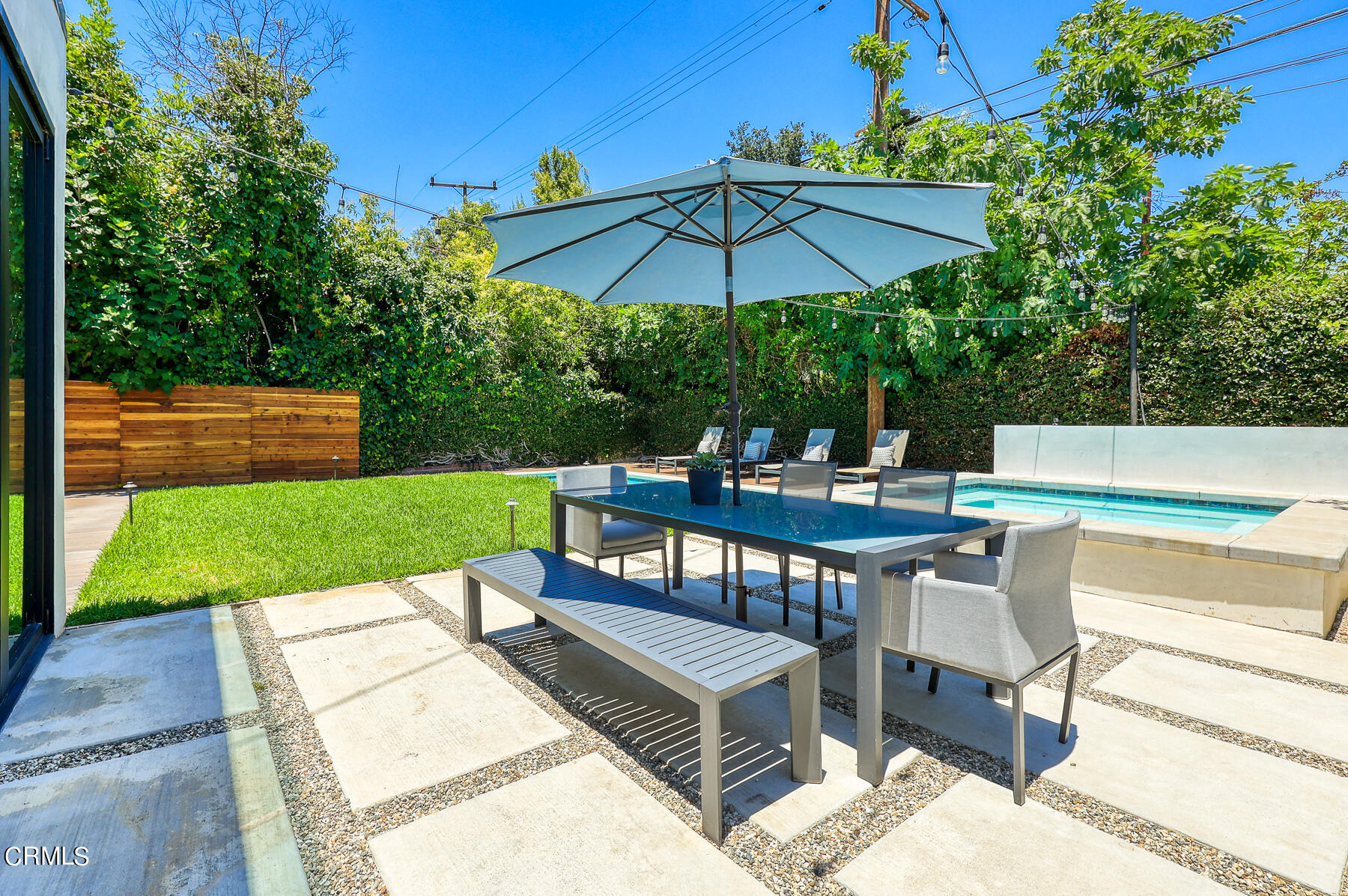 2065 Oakdale Street Pasadena, CA 91107 - Photo 4 of 7 a view of a chairs and table under an umbrella
