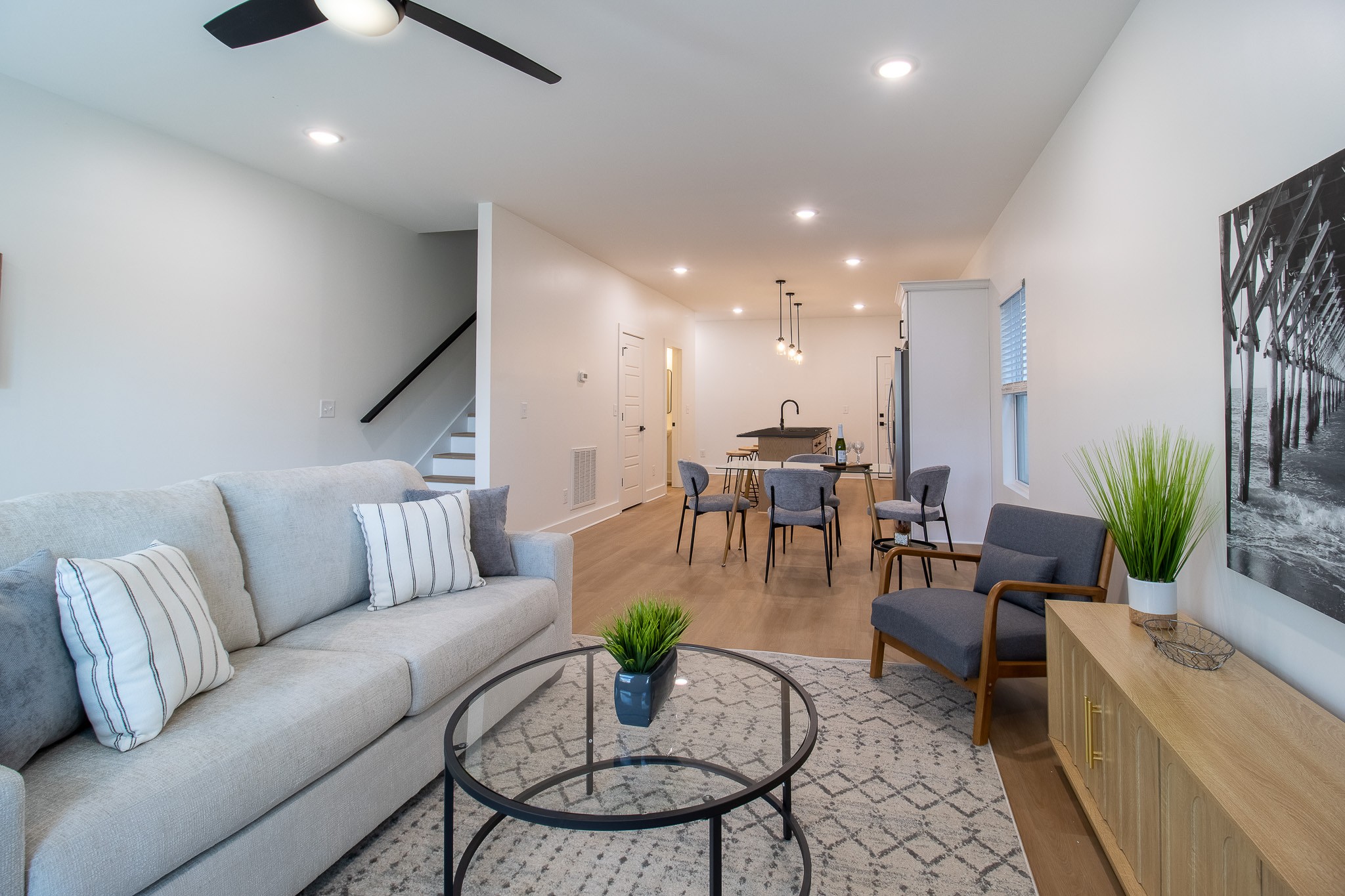 4024 University Avenue, Unit B Old Hickory, TN 37138 - Photo 11 of 30 a living room with furniture kitchen view and a chandelier