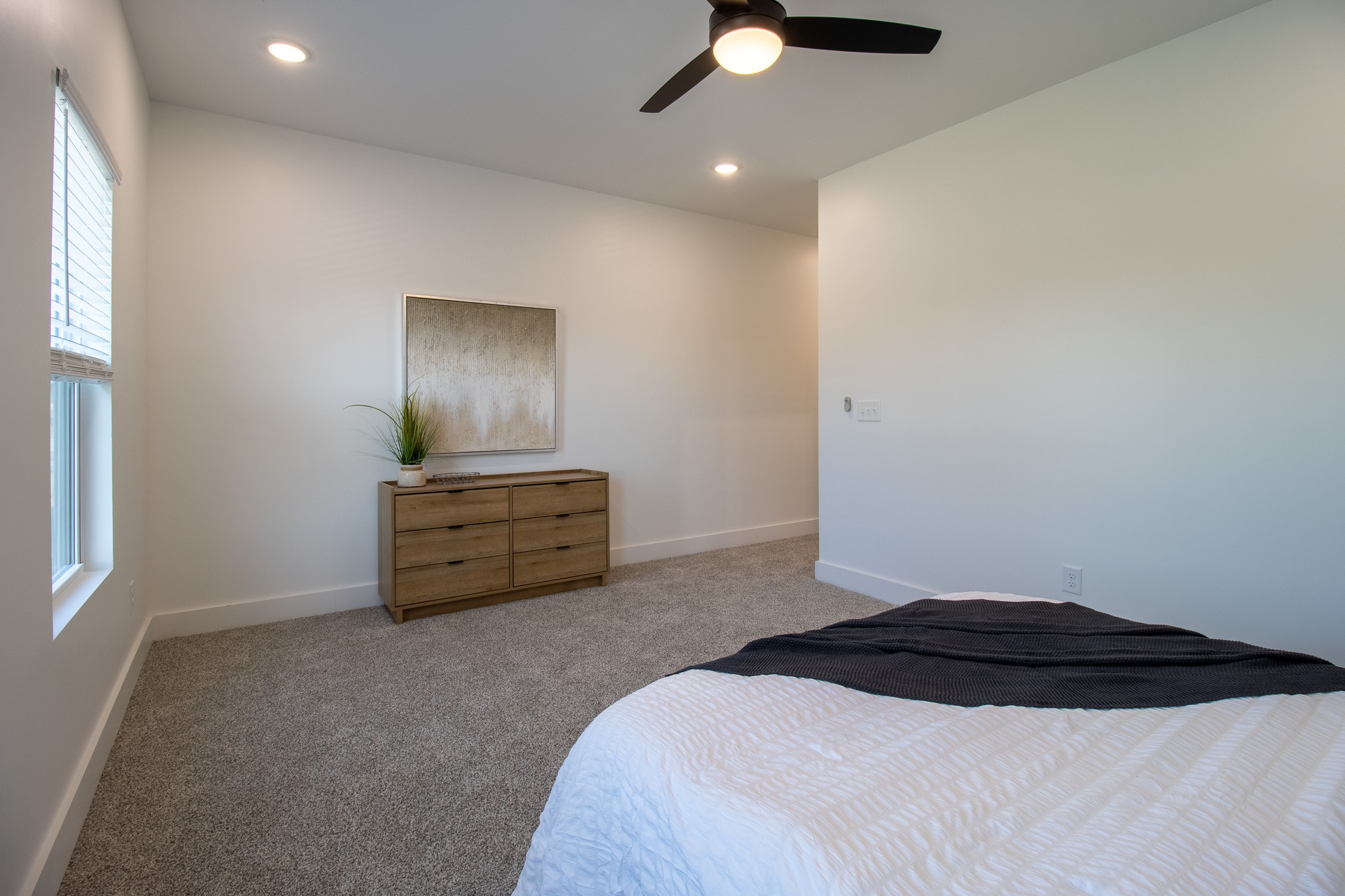 4024 University Avenue, Unit B Old Hickory, TN 37138 - Photo 17 of 30 a bedroom with a bed and a chandelier