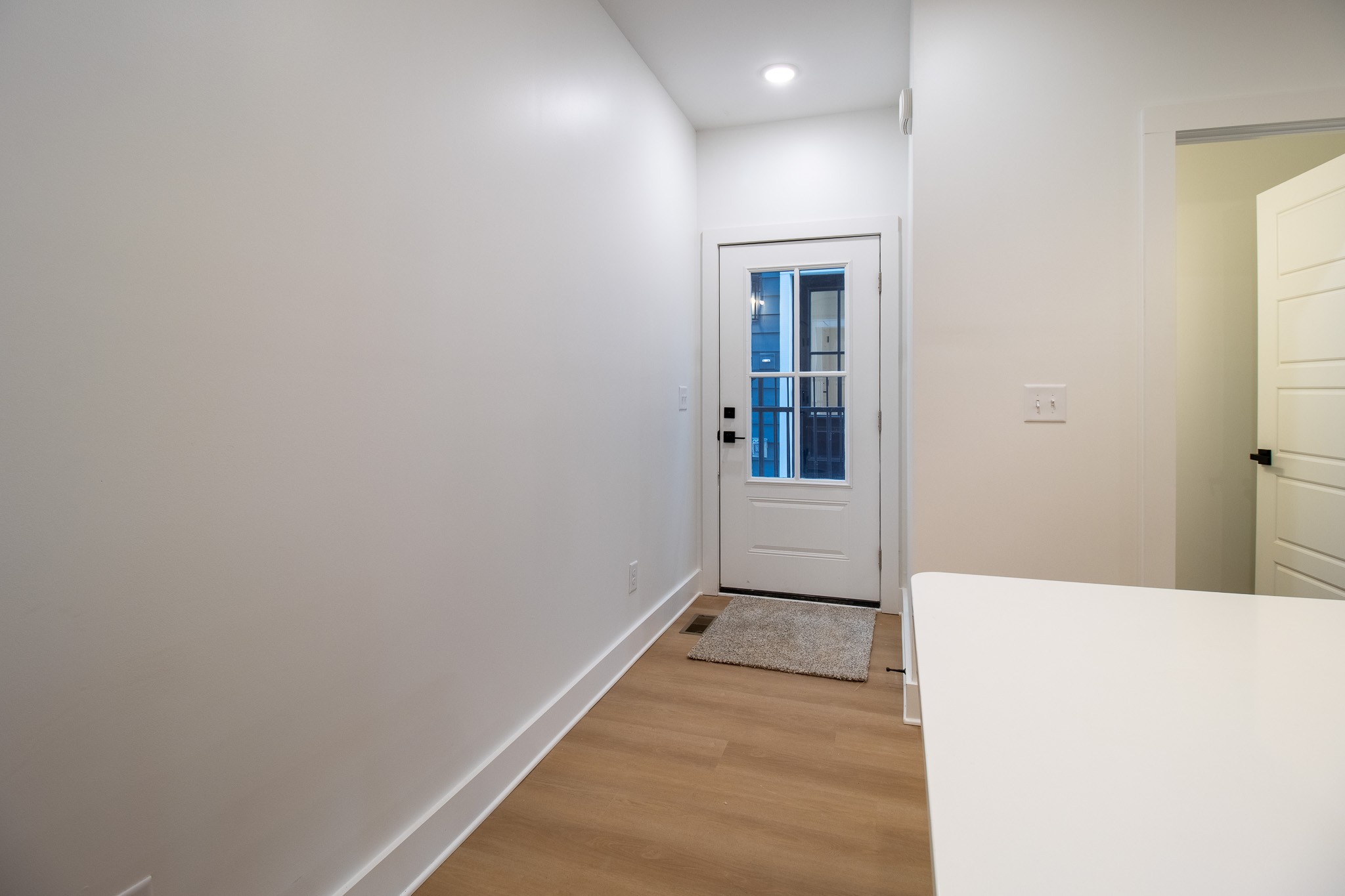 4024 University Avenue, Unit B Old Hickory, TN 37138 - Photo 2 of 30 a view of a hallway with wooden floor and a bathroom