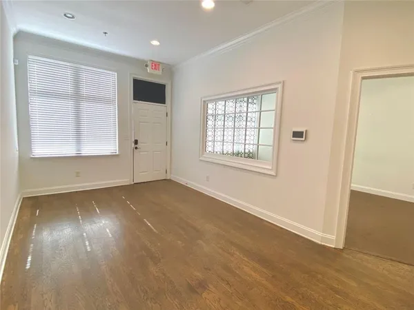 a view of an empty room with a window