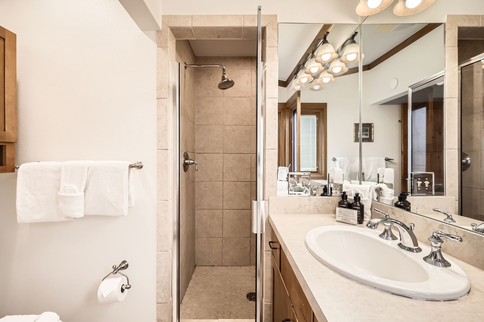 440 Tennis Club Road, Unit 1321 Keystone, CO 80435 - Photo 14 of 42 The primary bathroom boasts a walk-in shower and a sleek, updated vanity, offering both comfort and contemporary design