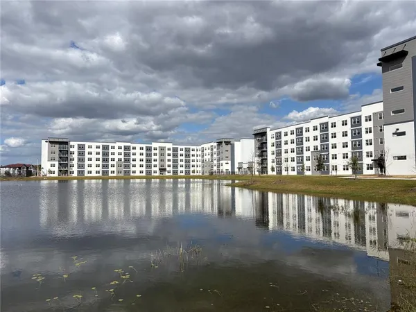 a view of building with lake view and boat