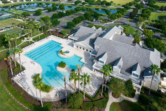 an aerial view of a house with outdoor space