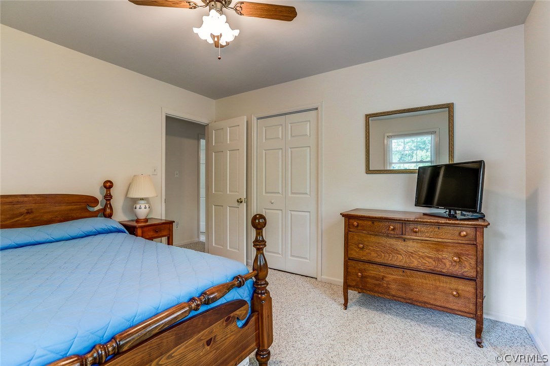 11431 Rochelle Road Chester, VA 23831 - Photo 19 of 23 a bedroom with furniture and a flat screen tv