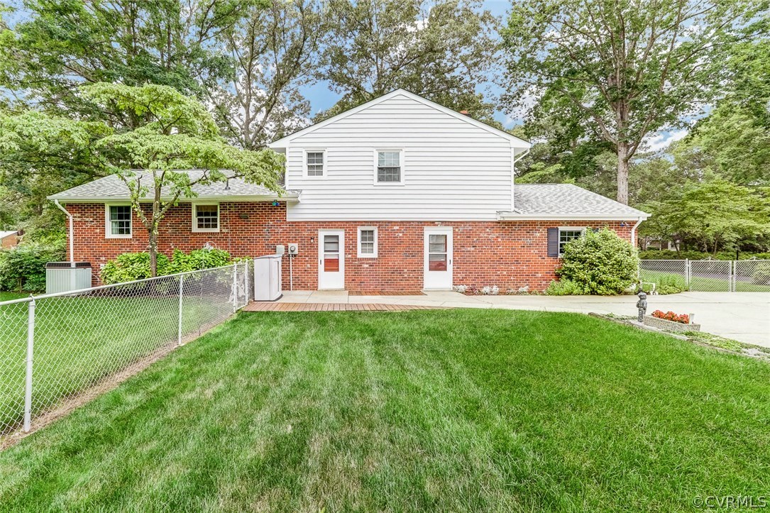 11431 Rochelle Road Chester, VA 23831 - Photo 23 of 23 a view of a house with a yard and sitting area