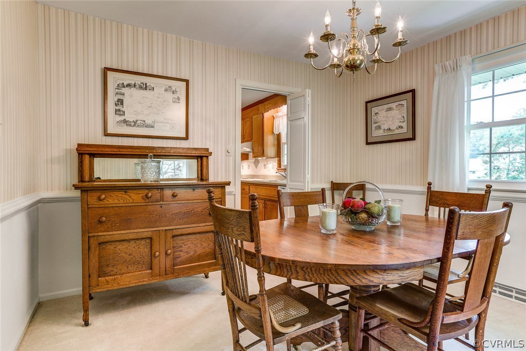 11431 Rochelle Road Chester, VA 23831 - Photo 9 of 23 a view of a dining room with furniture