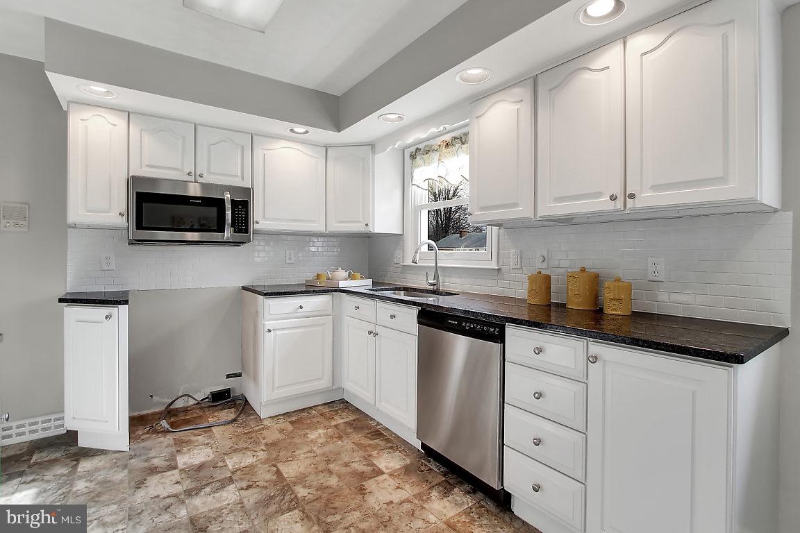 1101 Kalreda Road York, PA 17406 - Photo 11 of 27 White cabinets with new granite counters