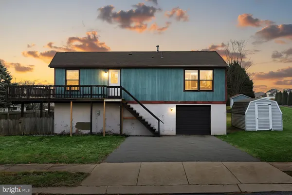 a view of a house with a patio