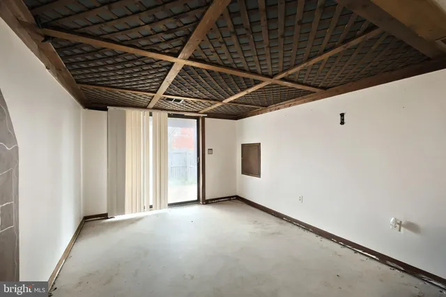a view of room with wooden ceiling