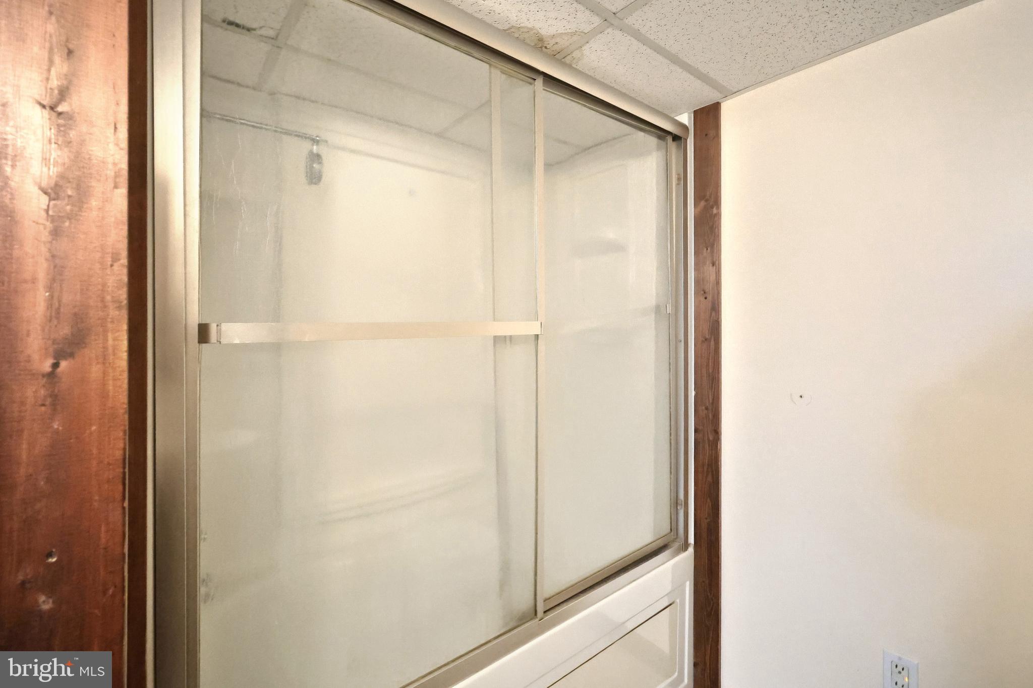 3160 Jessica Road Dover, PA 17315 - Photo 27 of 32 a bathroom with a glass shower door