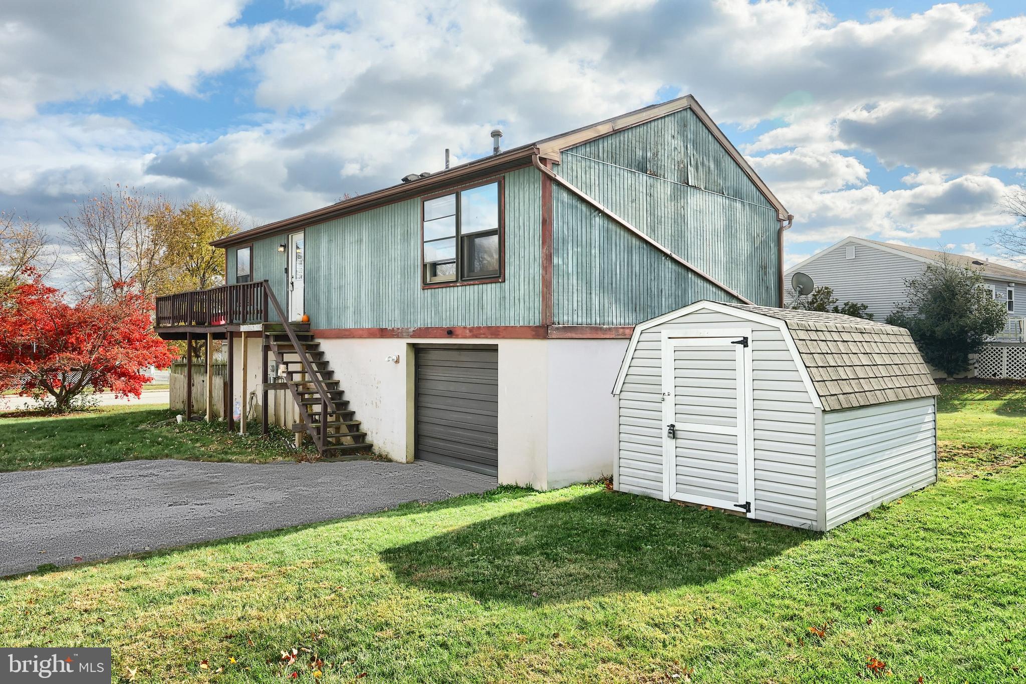 3160 Jessica Road Dover, PA 17315 - Photo 4 of 32 a view of a house with a yard
