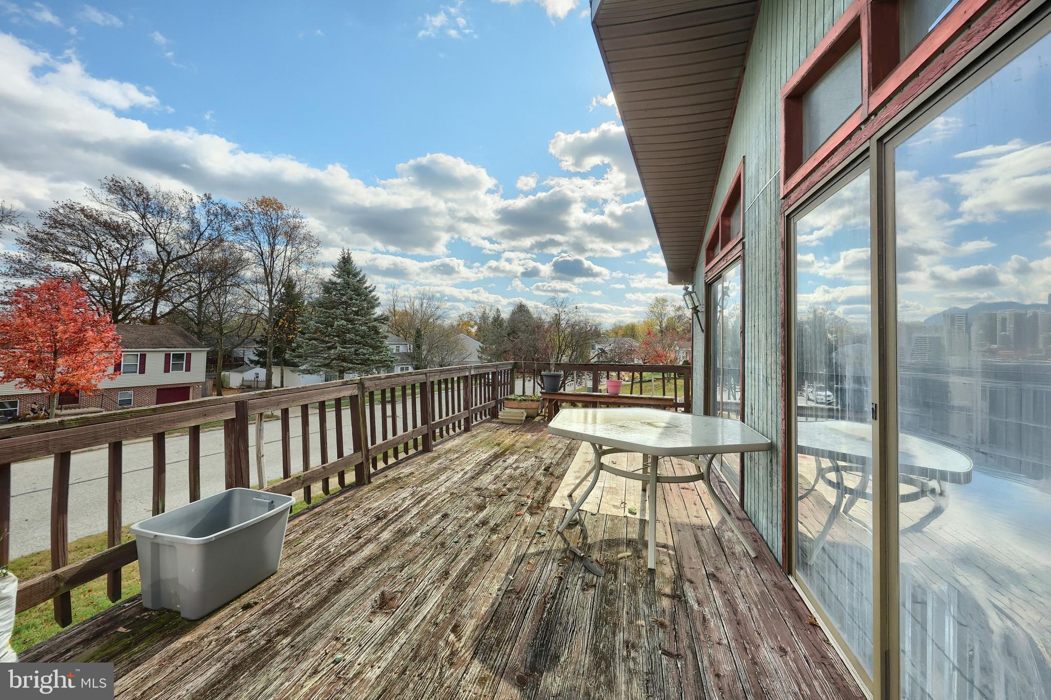 3160 Jessica Road Dover, PA 17315 - Photo 5 of 32 a view of roof deck with wooden floor and fence