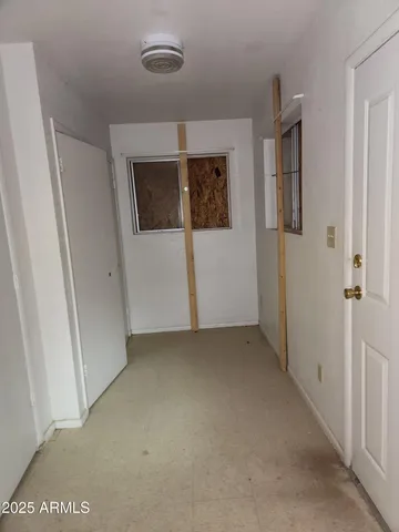 a bathroom with a sink a toilet a mirror and vanity