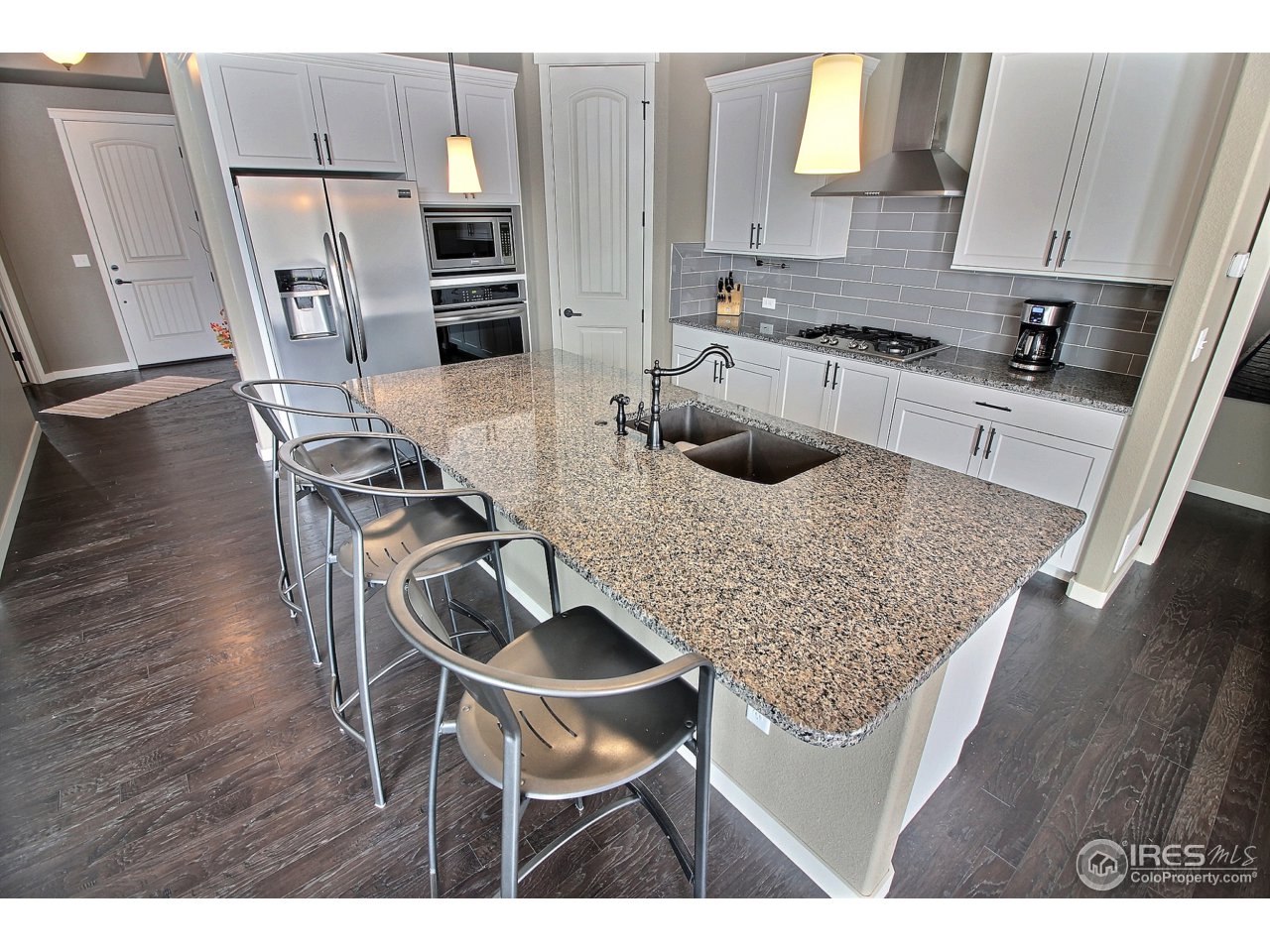 1518 Red Tail Road Eaton, CO 80615 - Photo 11 of 36 Granite and Quartz Counters Throughout