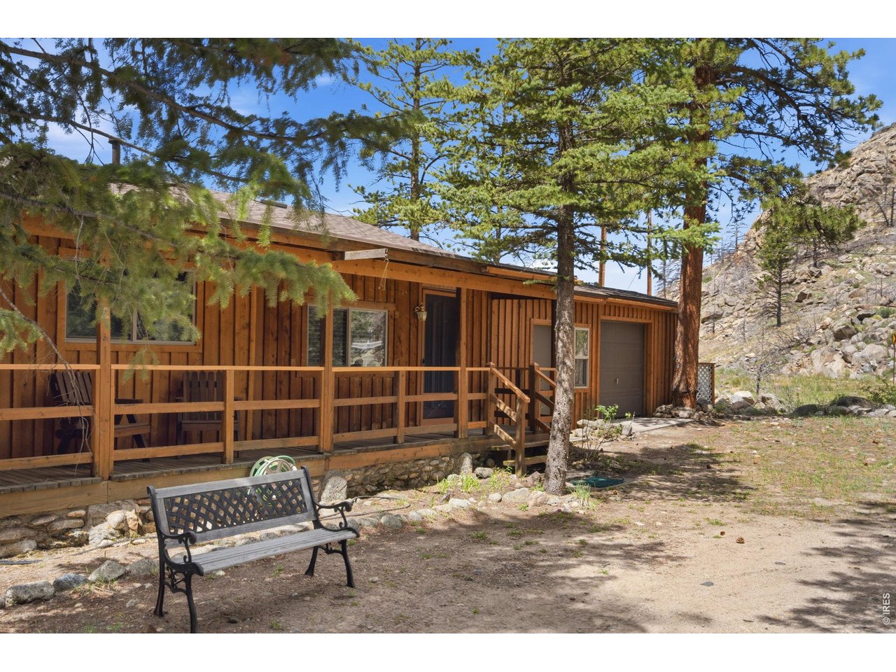 36917 Poudre Canyon Road Bellvue, CO 80512 - Photo 3 of 46 Discover a welcoming wraparound porch
