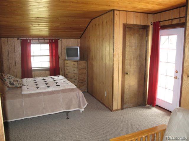 17075 County Road 220 Salida, CO 81201 - Photo 15 of 18 a bedroom with a bed and a window