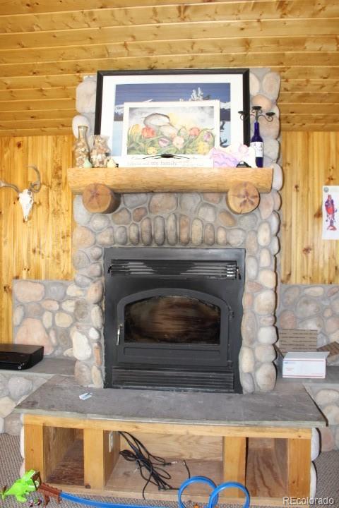 17075 County Road 220 Salida, CO 81201 - Photo 7 of 18 a living room with a fireplace