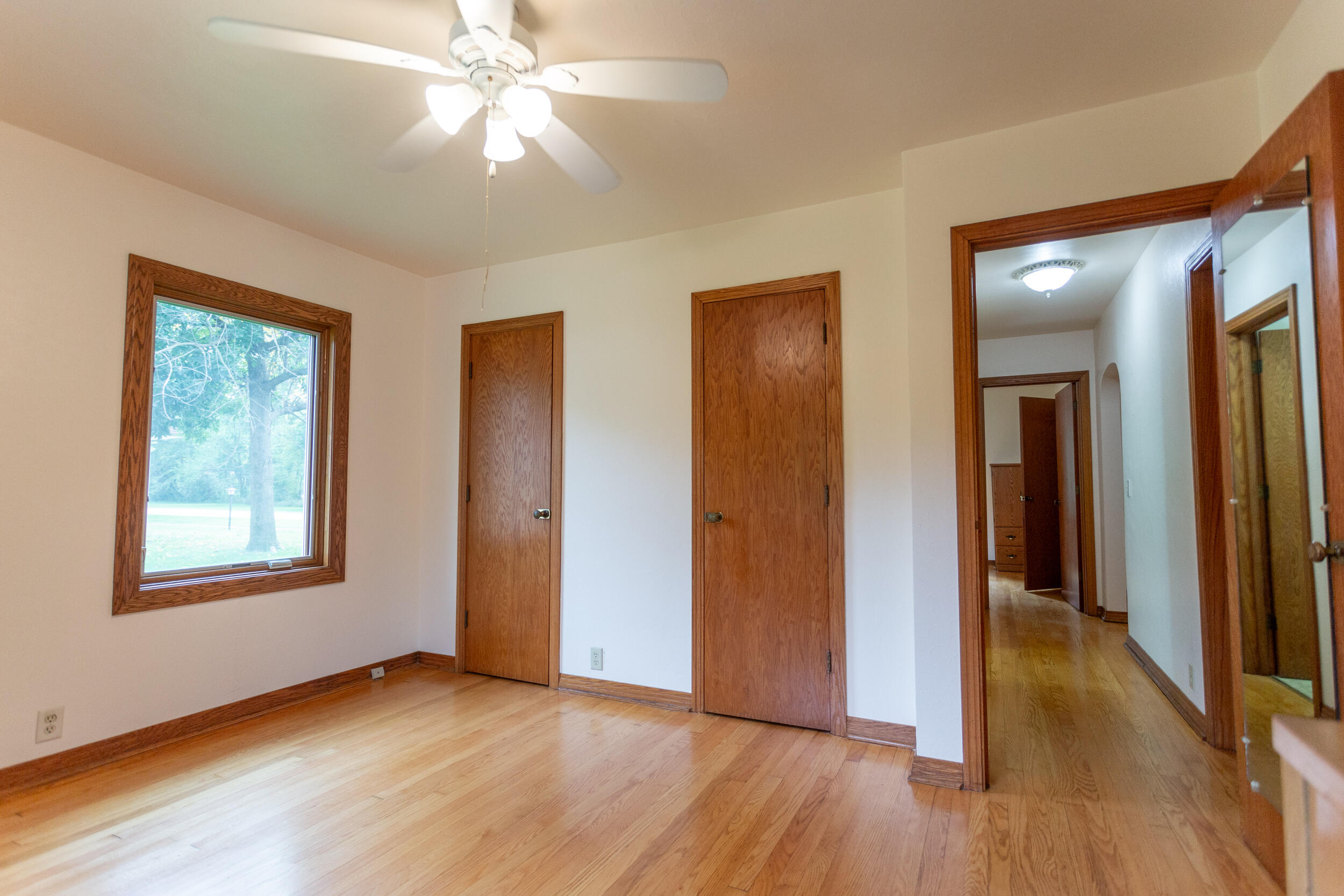 601 East Main Street La Crosse, IN 46348 - Photo 17 of 29 a view of an empty room with window and wooden floor