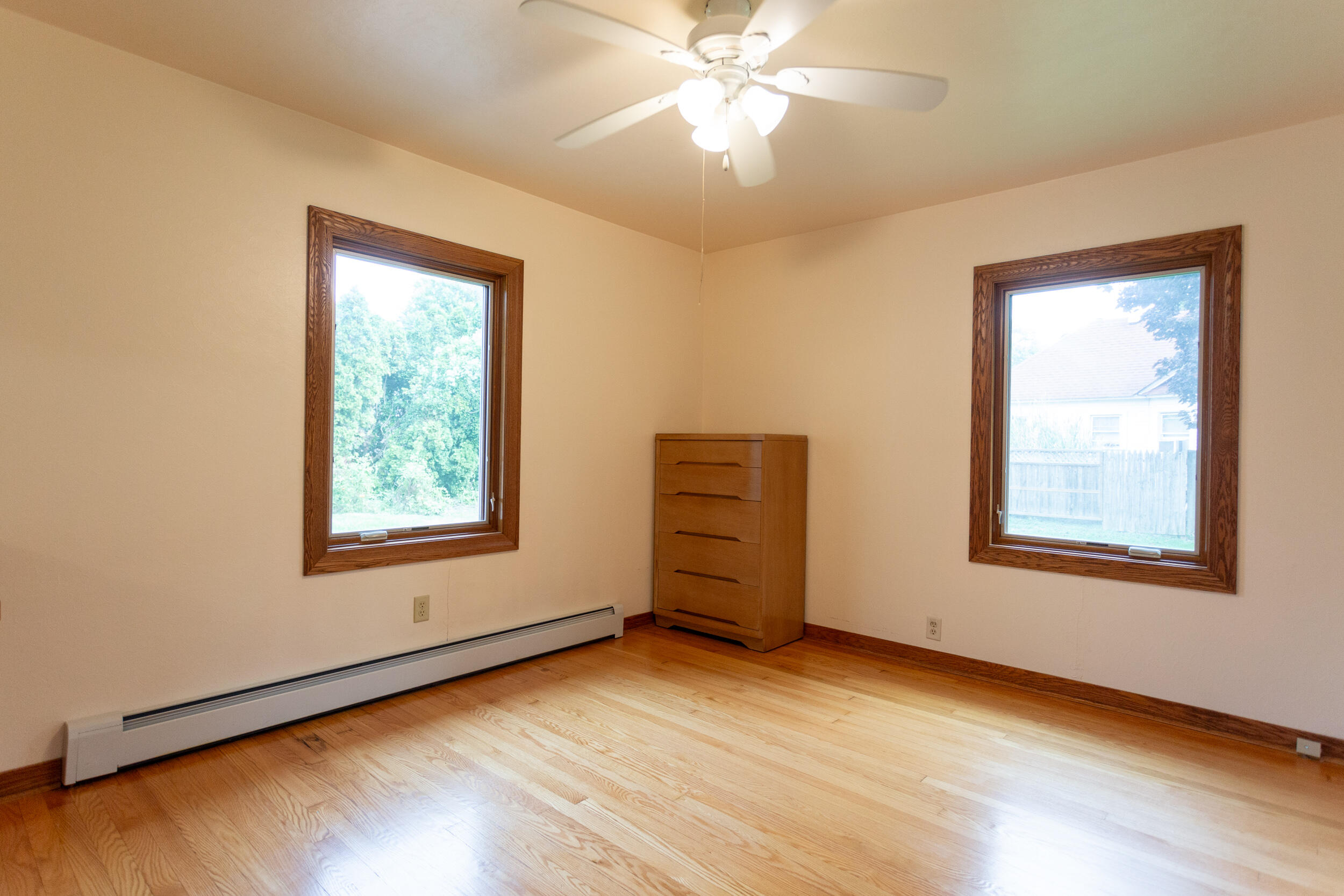 601 East Main Street La Crosse, IN 46348 - Photo 19 of 29 a view of an empty room with a window and wooden floor