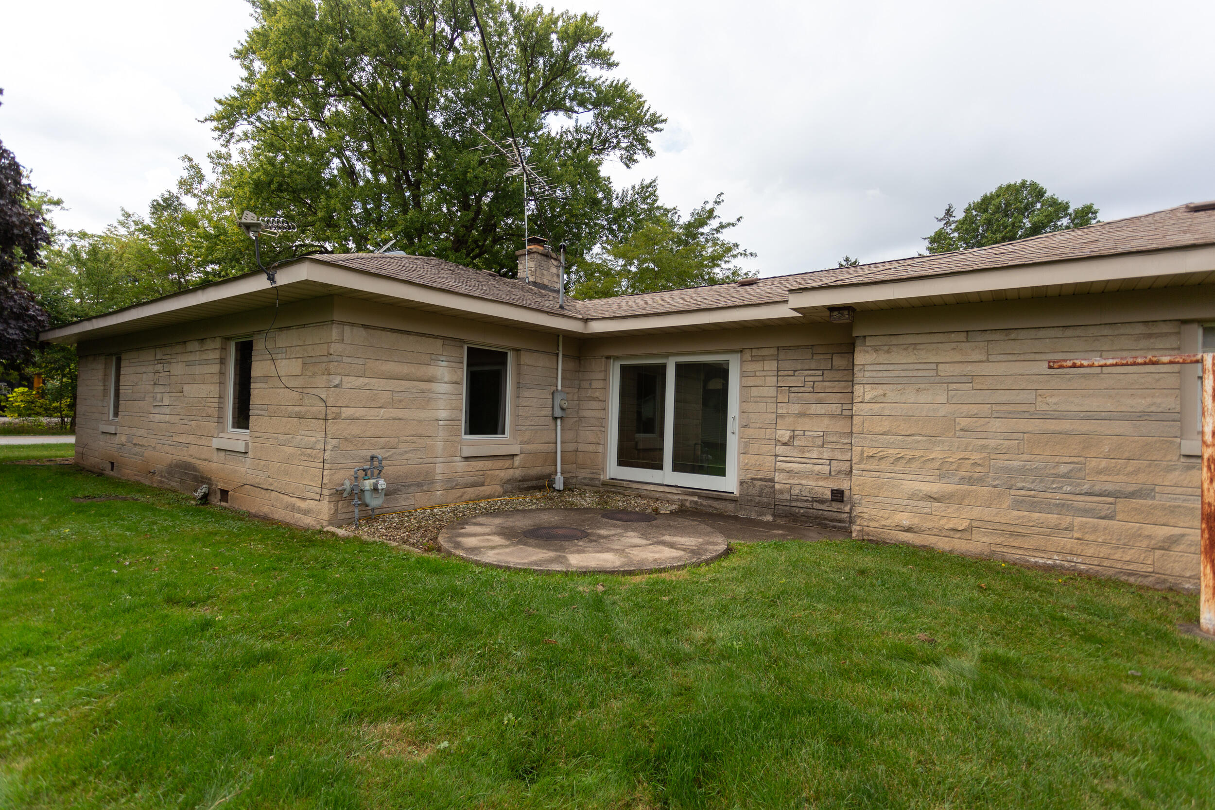601 East Main Street La Crosse, IN 46348 - Photo 28 of 29 a backyard of a house with table and chairs