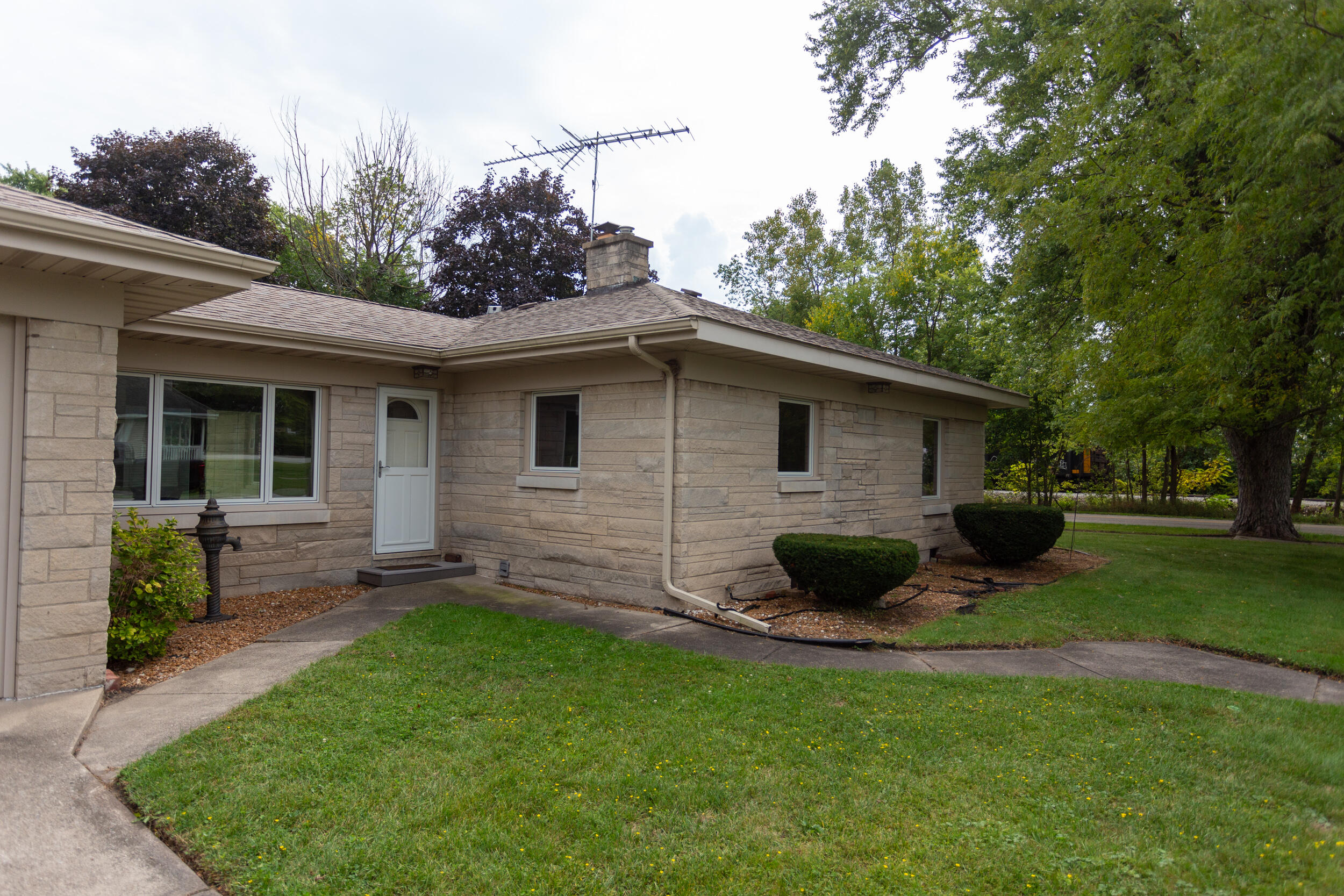 601 East Main Street La Crosse, IN 46348 - Photo 29 of 29 a backyard of a house with table and chairs
