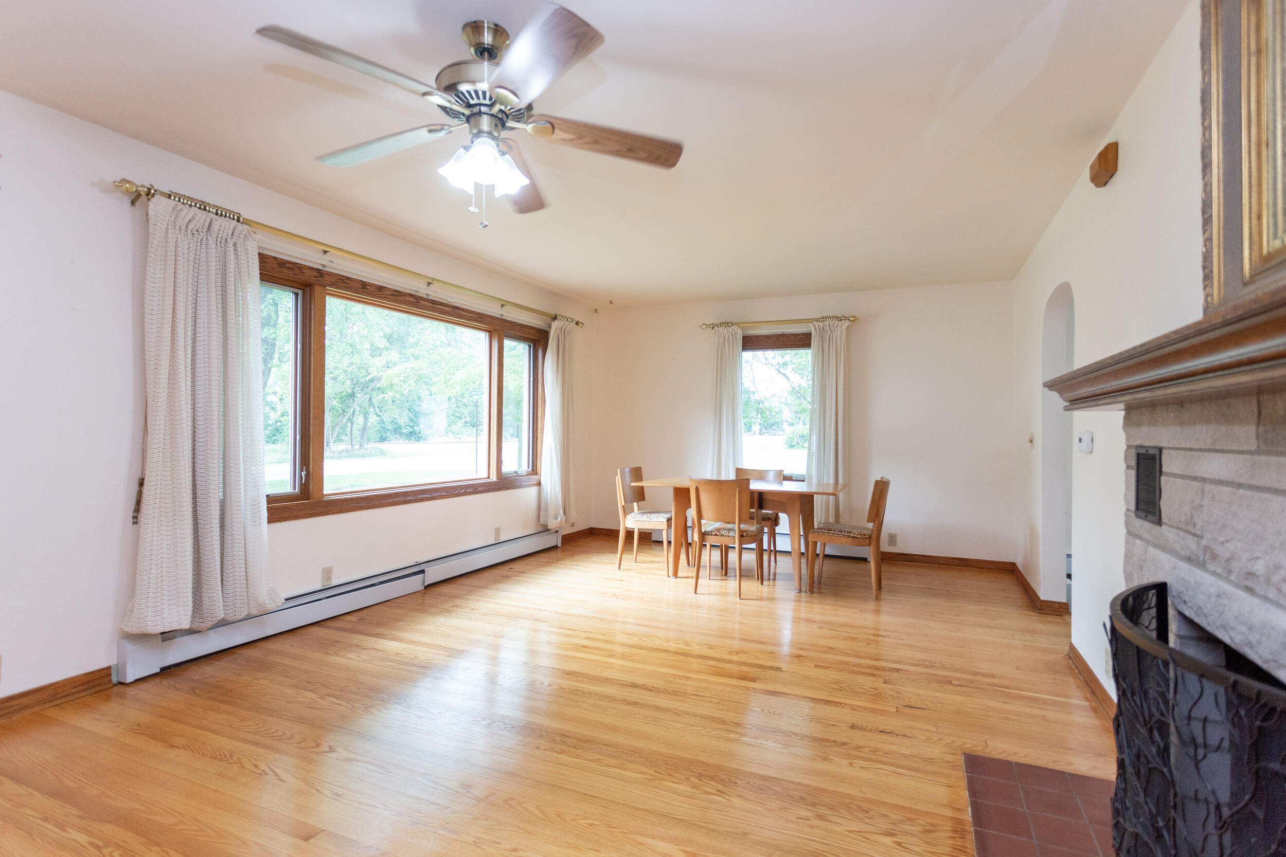 601 East Main Street La Crosse, IN 46348 - Photo 6 of 29 a view of a dining room with furniture window and wooden floor